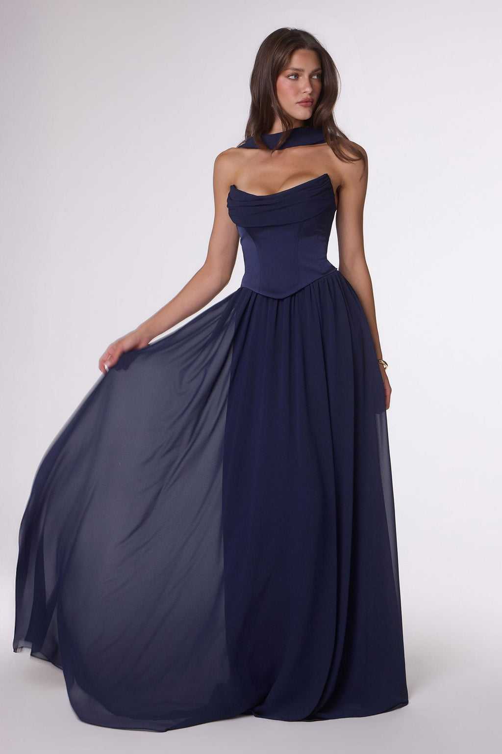 Navy strapless chiffon A-line evening gown with ruched bodice and flowing skirt