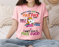 Pink graphic crew-neck t-shirt with unicorn and colorful text front print