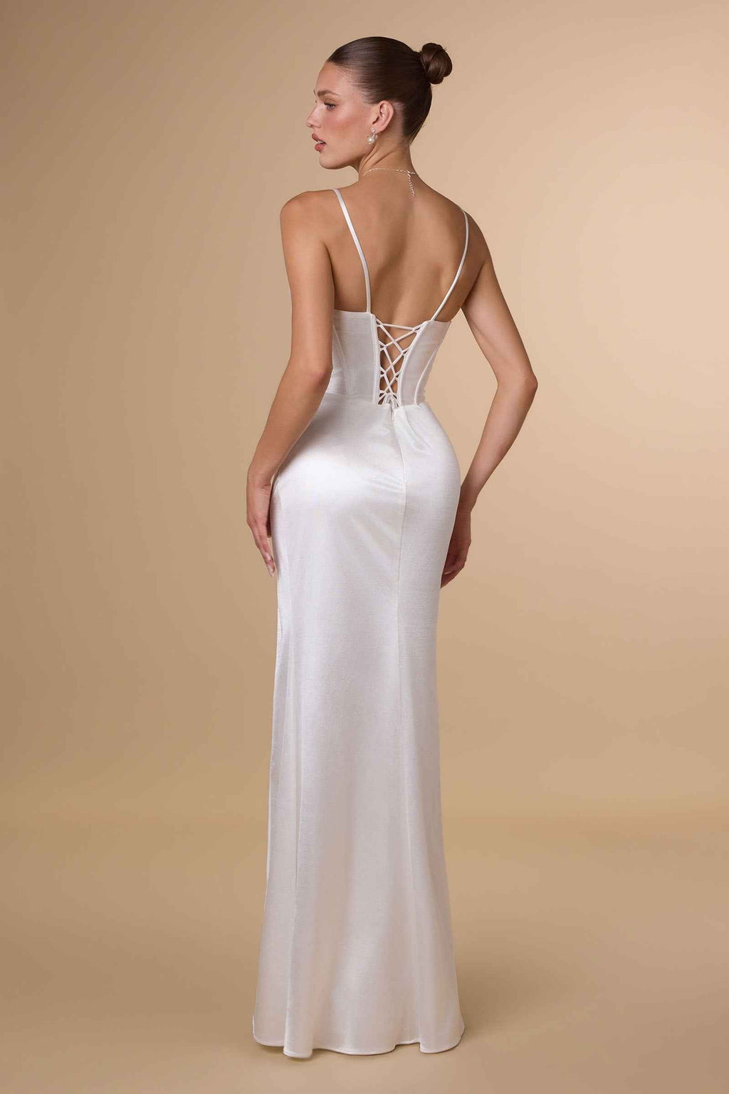 Back view of off-white satin corset-style dress with crisscross straps