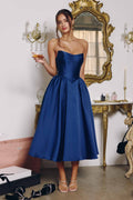 Navy strapless midi gown with sweetheart bodice and flared, pleated skirt