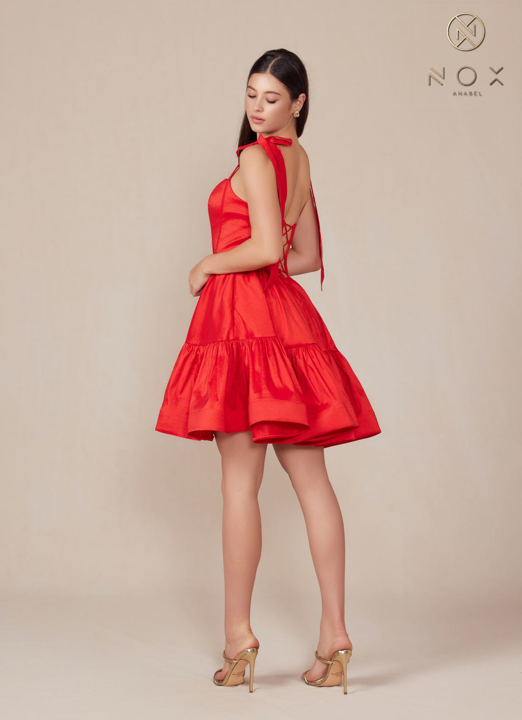 Red A-line dress back with tie ribbon straps and tiered ruffle skirt