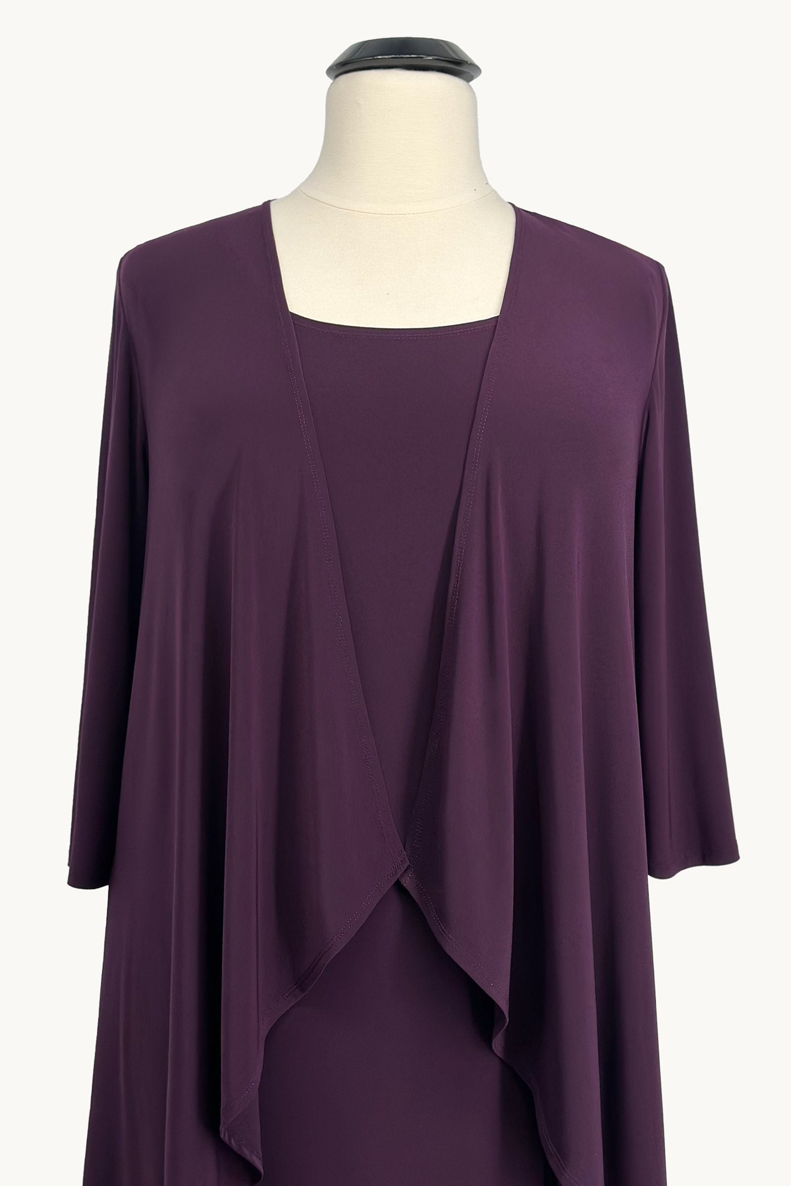 Eggplant purple semi-formal gown set back view with cape overlay drape detail