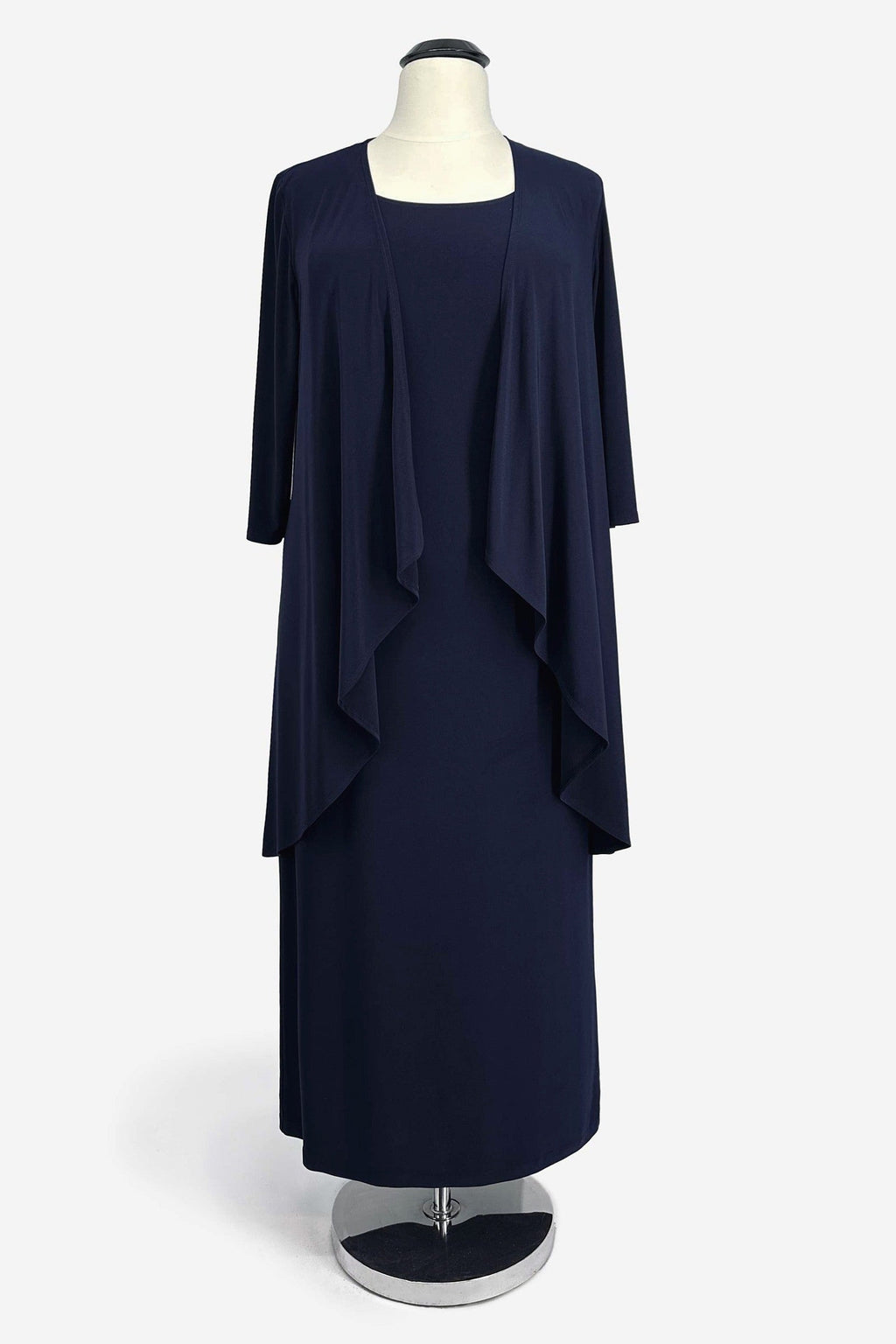 Navy two-piece evening gown on a mannequin with draped shawl-style top layer