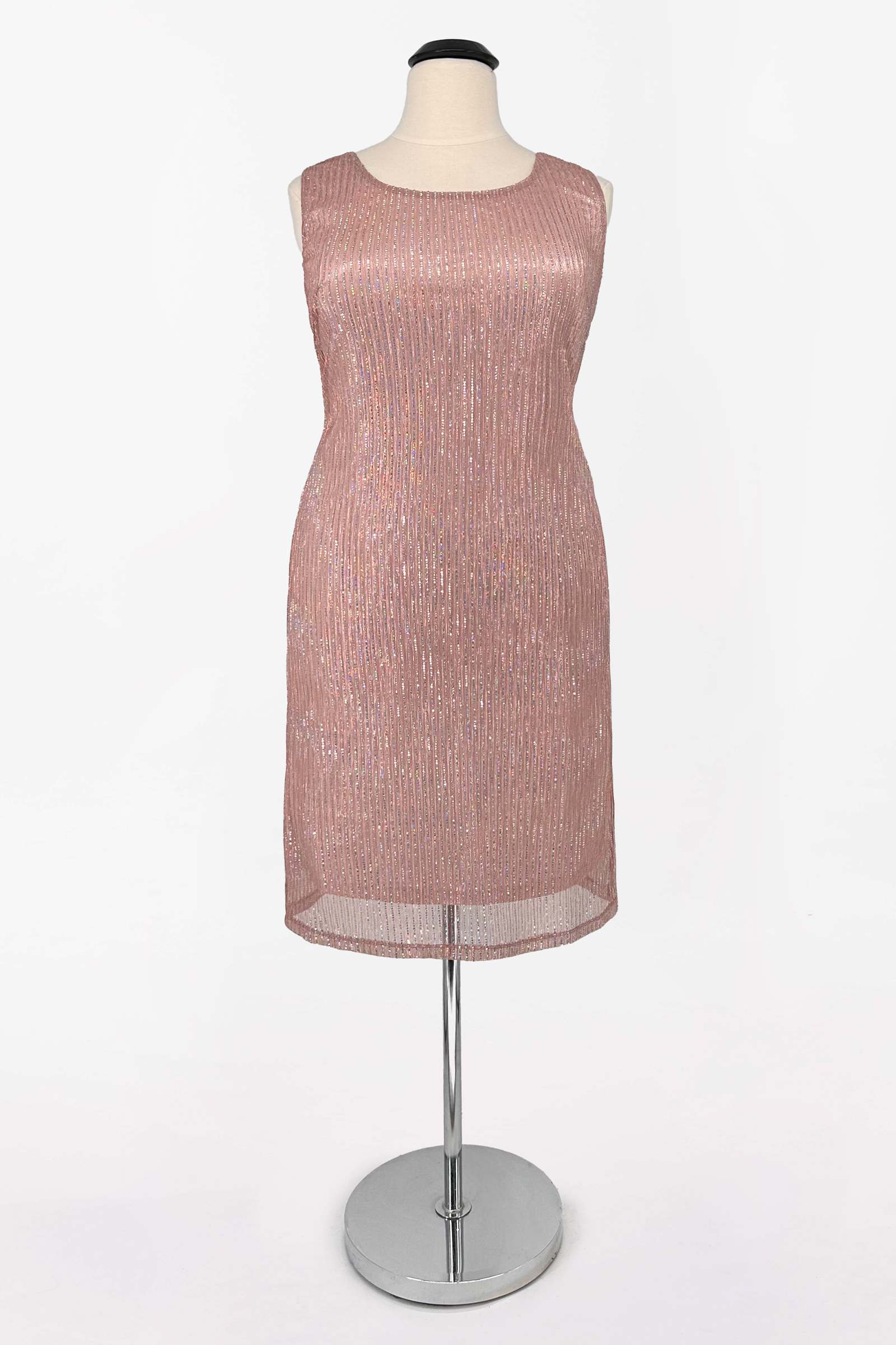 Rose gold sequin sleeveless evening dress with sheer hem overlay on dress form