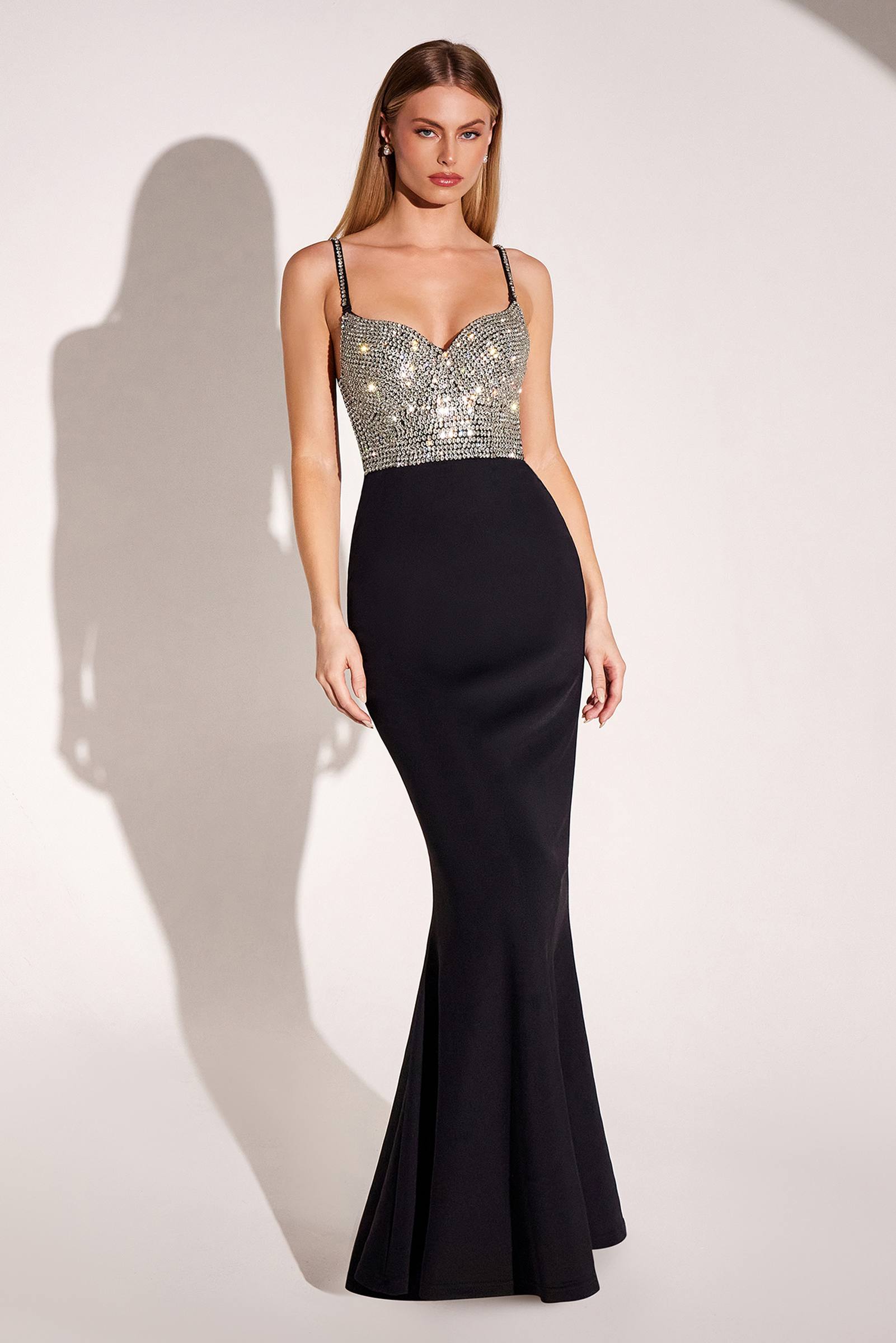Black fitted gown with silver embellished sweetheart bodice and narrow shoulder straps