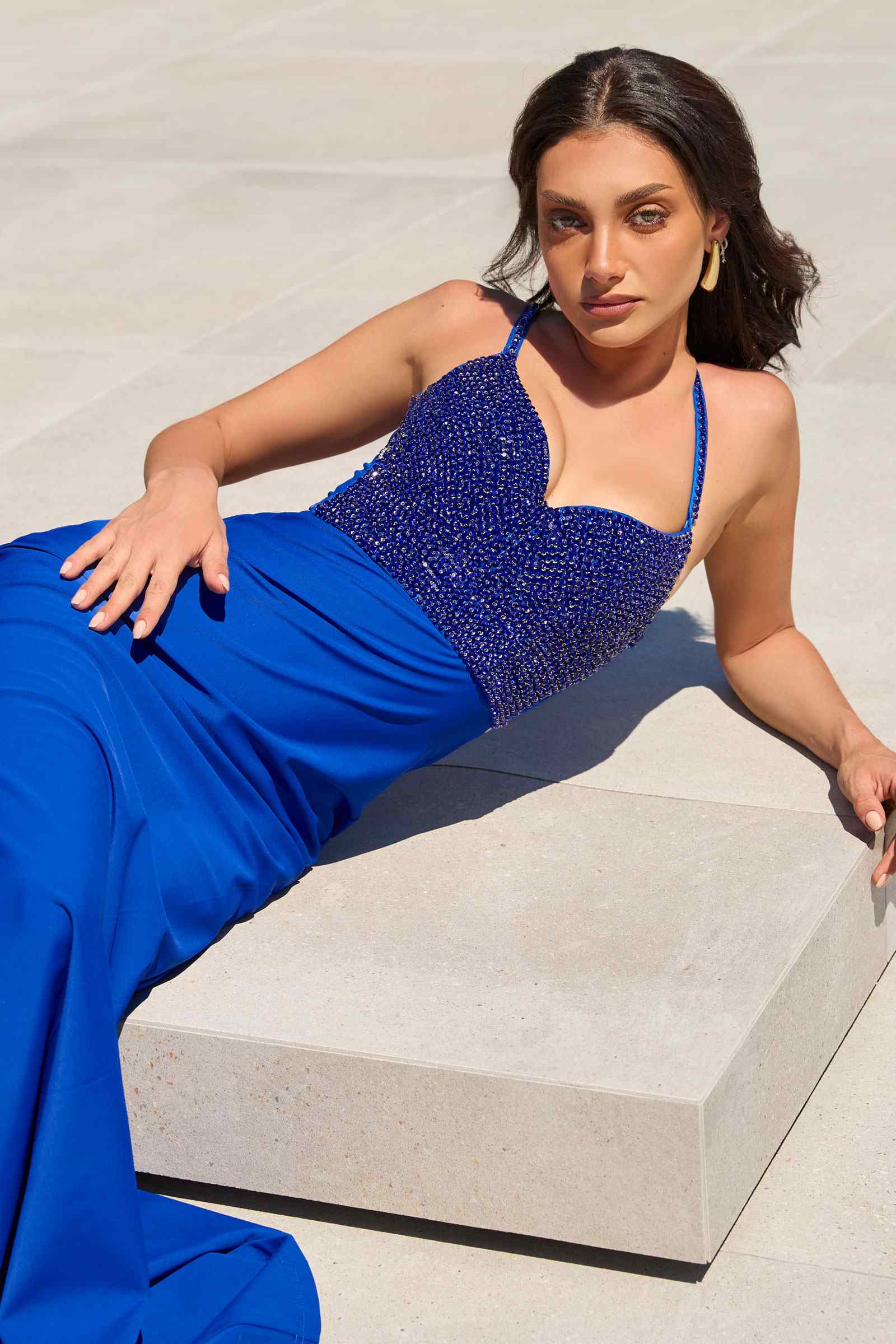 Royal blue fitted formal gown with embellished bodice and halter neckline
