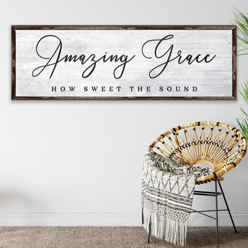 Framed canvas wall art with dark wood frame, gray background, “Amazing Grace” lettering