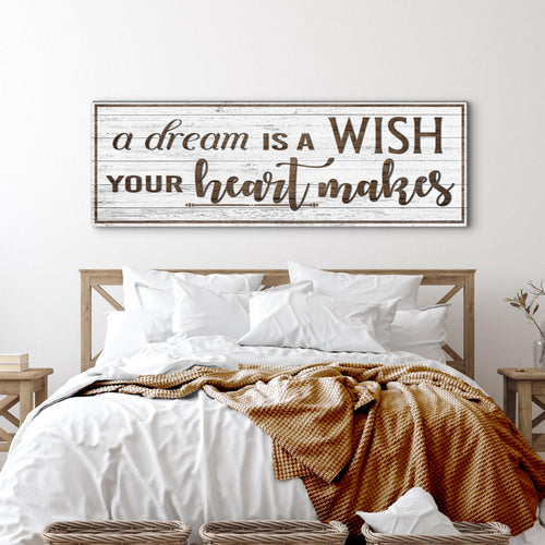 Inspirational wall sign with distressed frame and quote 'a dream is a WISH'