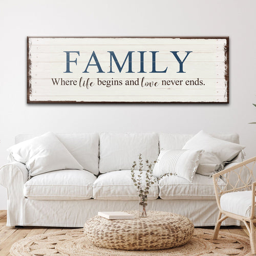 Family wall sign with blue 'FAMILY' and quote on white distressed wood