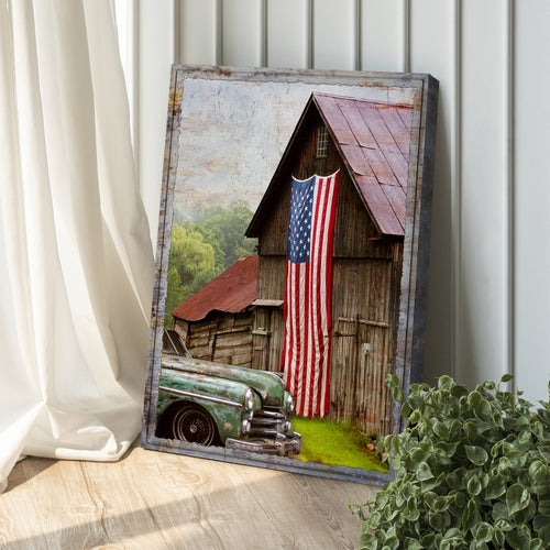 Canvas wall art of rustic barn with American flag and vintage truck, gray frame