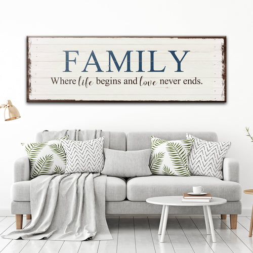 Family wall sign with blue 'FAMILY' and life-love never ends quote