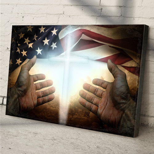 Framed canvas wall art showing hands reaching toward a glowing cross with stars and stripes