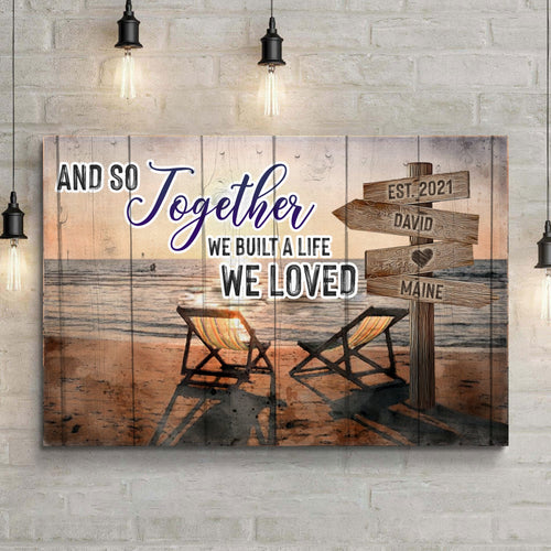 Couple sign canvas with two deck chairs, wood posts, and “Together” lettering in blue