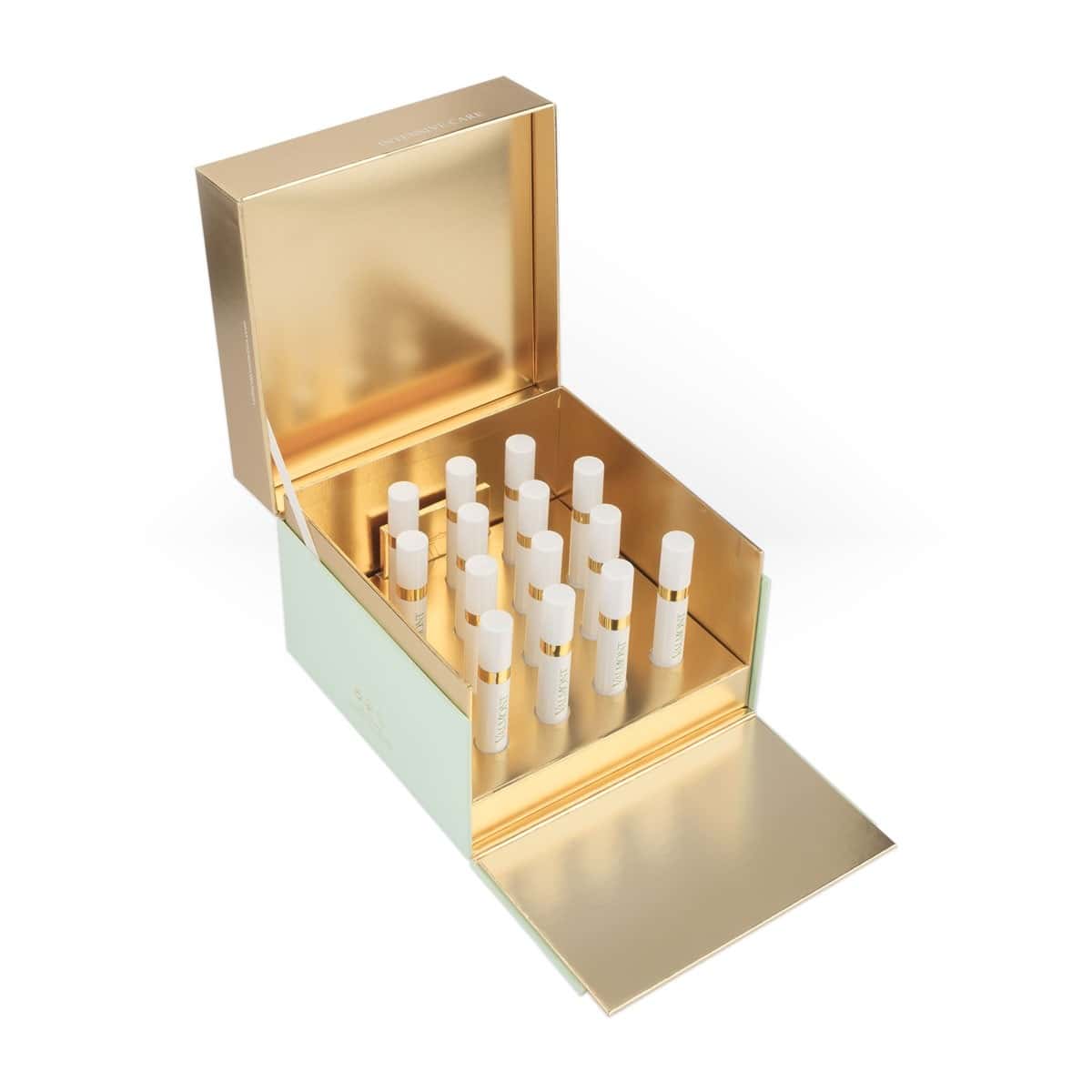 Skincare vial set with multiple ampoules in an open box