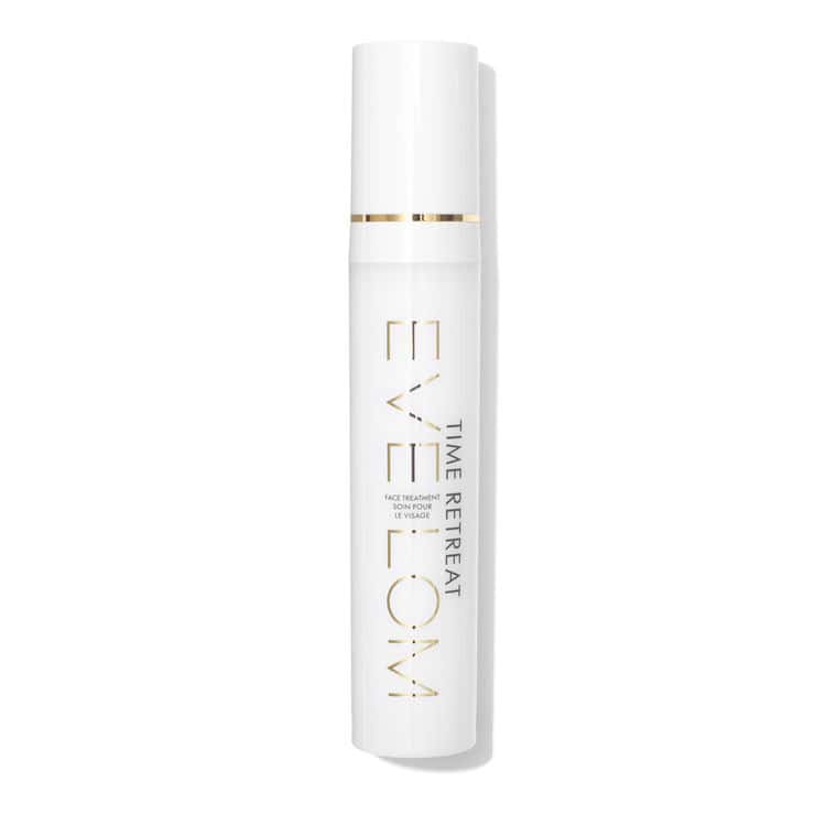 TIME RETREAT face treatment bottle, white with gold trim and vertical label