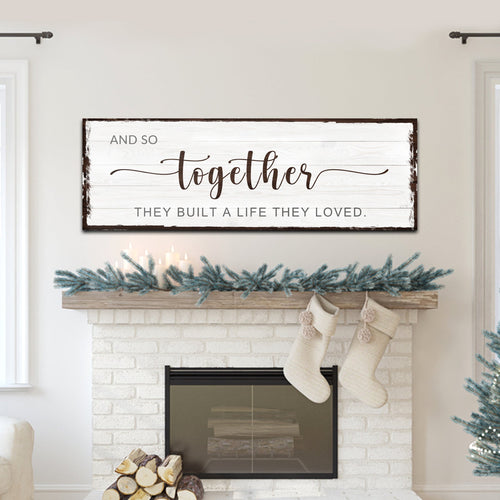 Wood-framed wall sign with “Together” quote and dark lettering on light plank