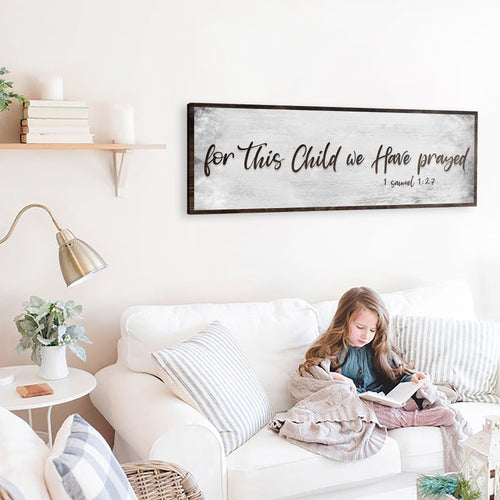 Framed landscape wall sign with cursive text, “For this Child we have prayed”