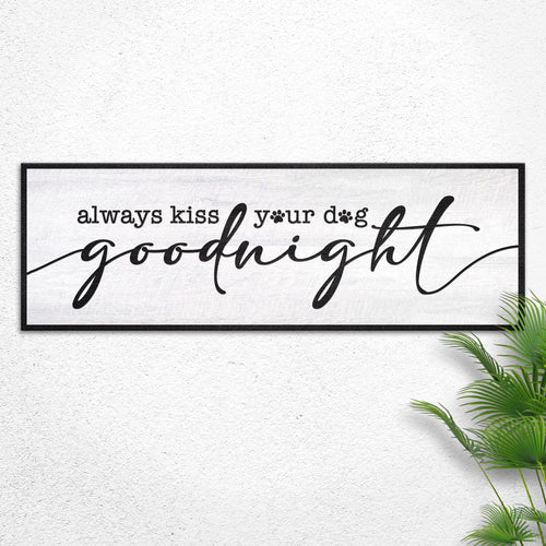 Dog goodnight wall sign in black frame with cursive "always kiss your dog goodnight"