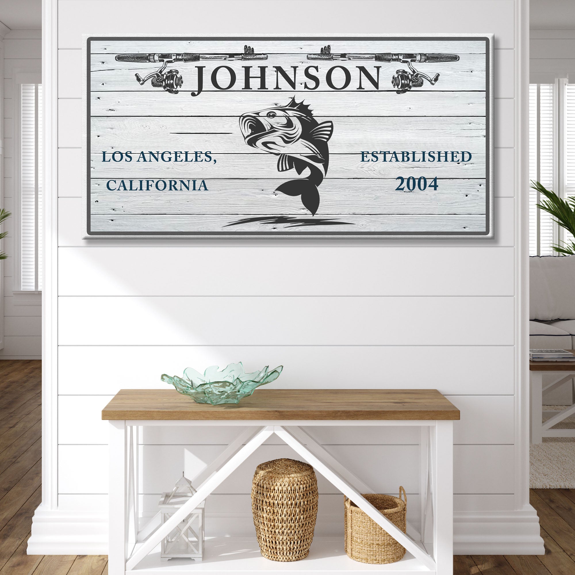 Framed fish-themed wall sign with JOHNSON lettering and fish silhouette graphic