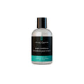 Peppermint beard conditioner bottle with clear body and black label