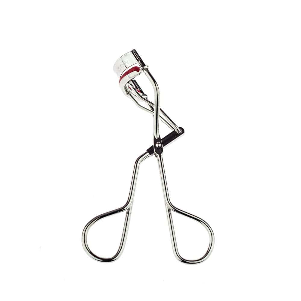 Metal eyelash curler with curved pad and red accent, hinged handle, chrome finish