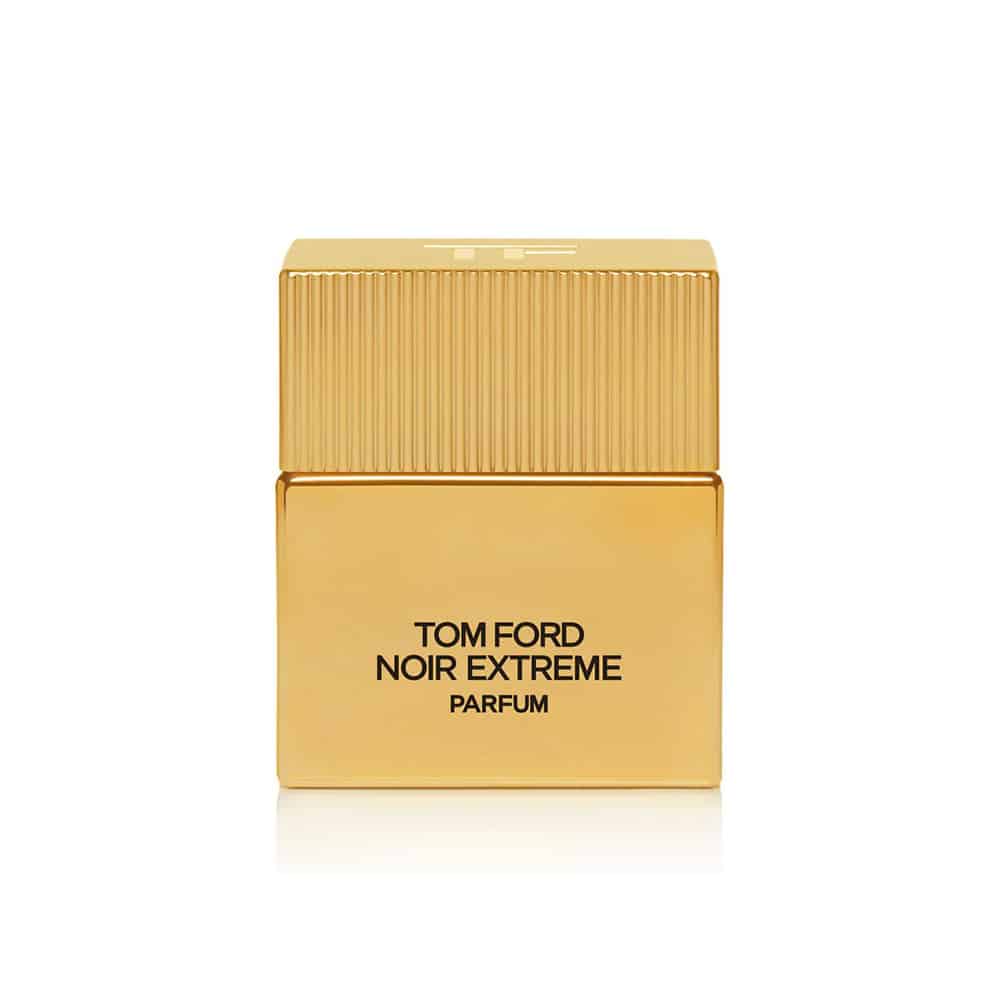 Parfum bottle with ribbed gold cap and gold-toned label