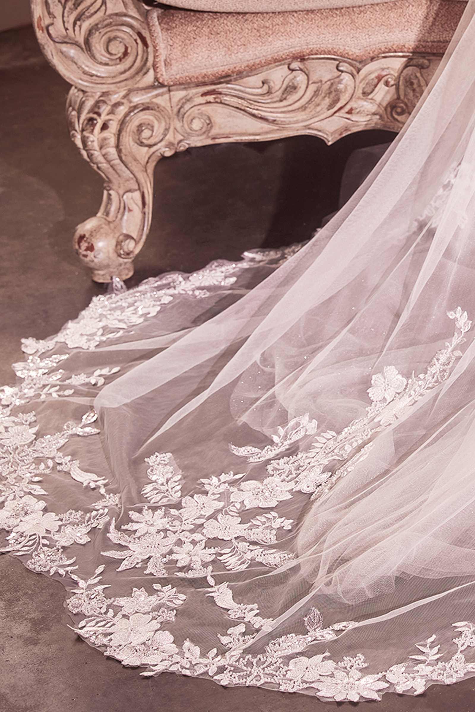 Off-white chapel veil with floral lace appliqué border