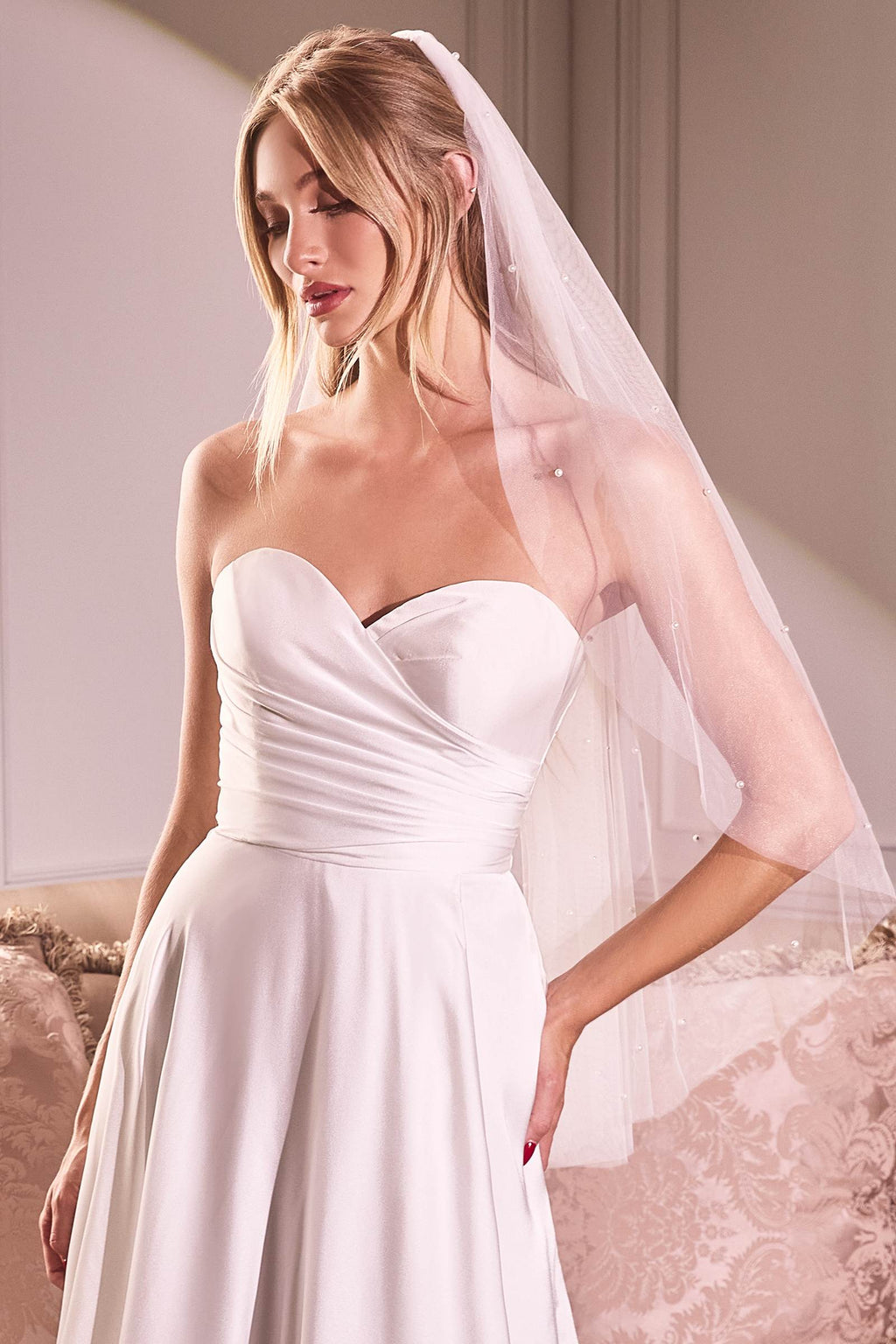Off-white fingertip bridal veil with pearl beaded drop details
