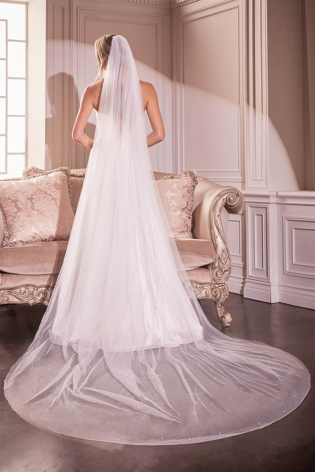 Off-white long bridal veil with layered tulle and trailing hem