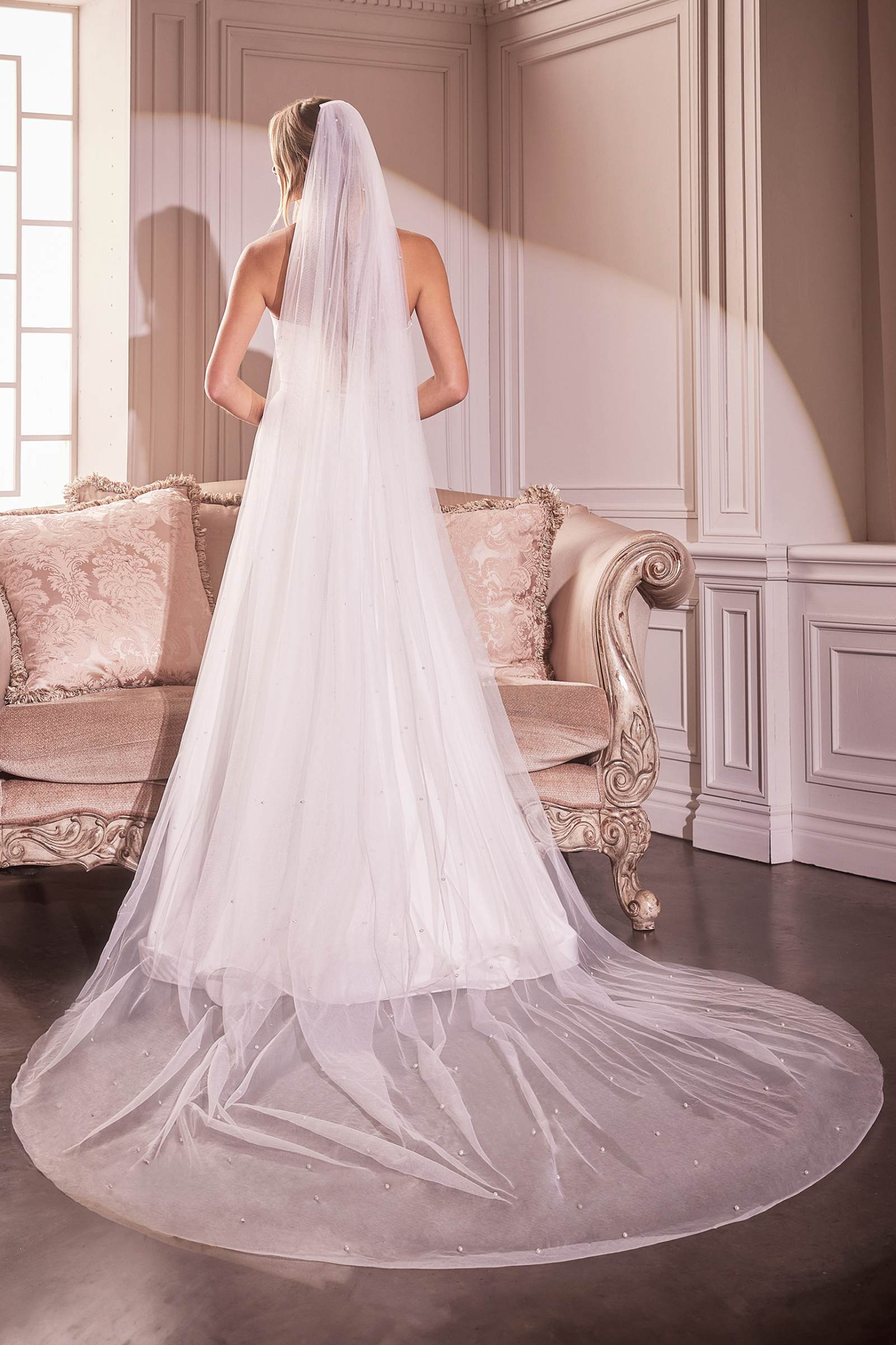 Off-white long bridal veil with layered tulle and trailing hem