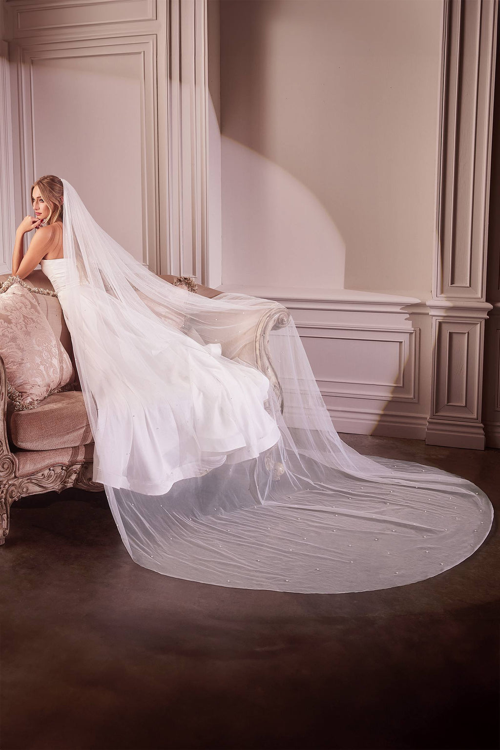 Off-white bridal veil with pearl drops and long flowing drape