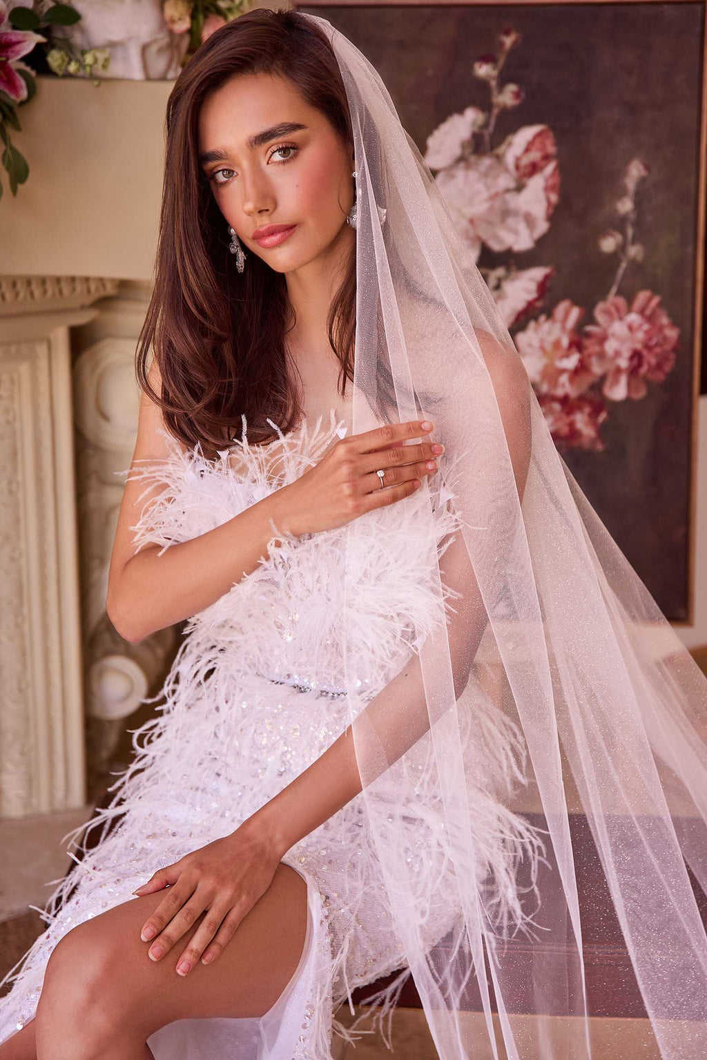 Off-white sheer sparkle cathedral veil with long drape and glittered edge