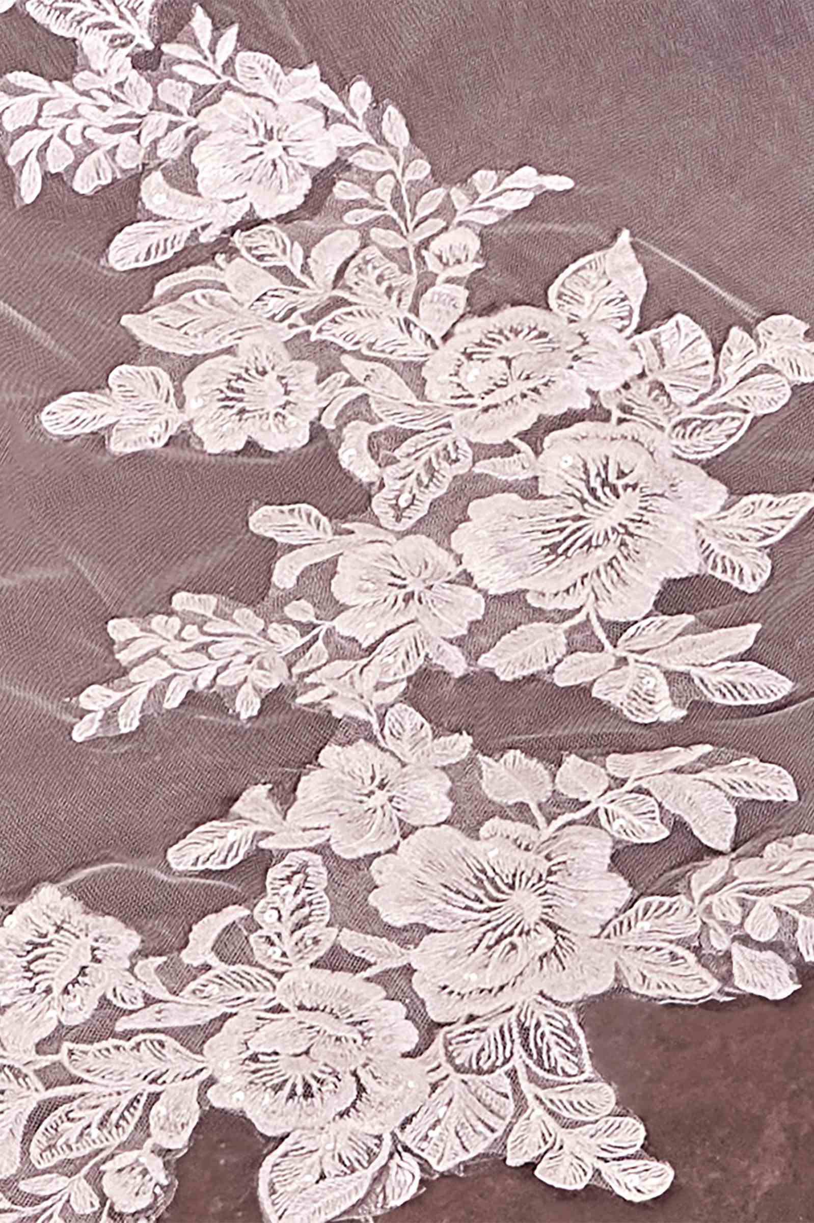 Off-white floral lace embroidery on sheer veil panel