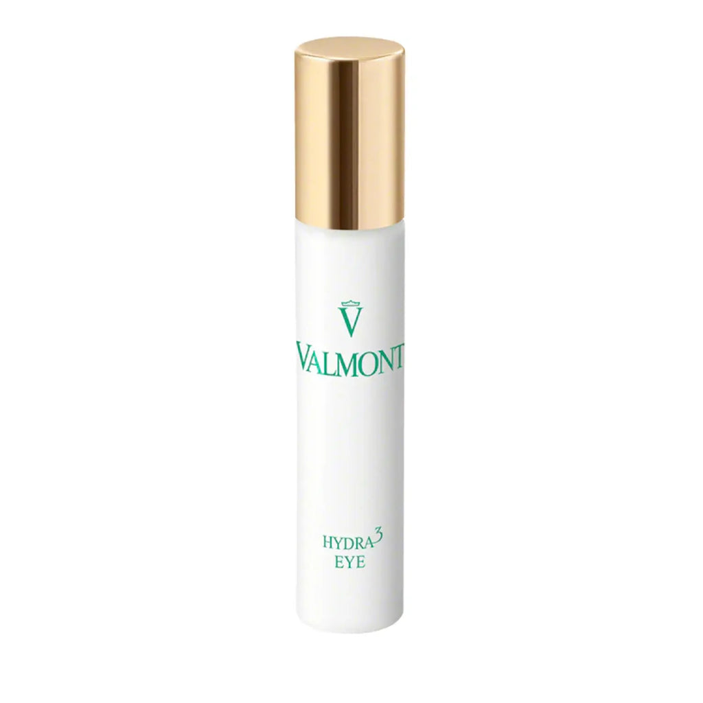 Eye cream bottle with gold cap and white body, Valmont branding