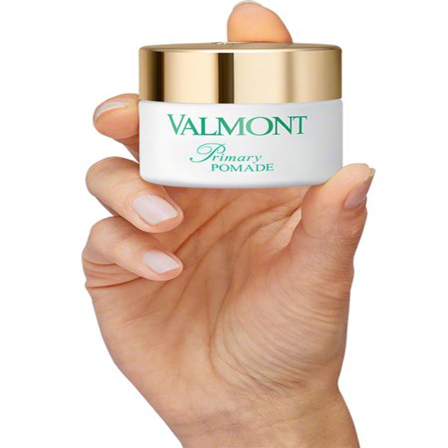 Valmont Primary Pomade jar held in hand
