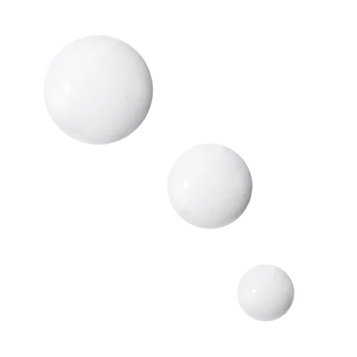 White cream texture swatches, three small dots