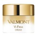 Valmont V-Firm cream jar, white body with gold lid and label text