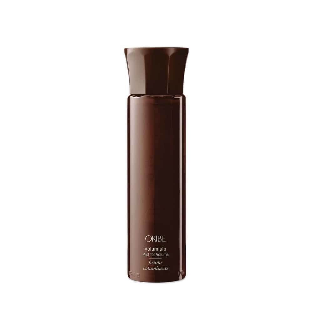 Oribe Volumista volumizing mist bottle, dark brown cylindrical container with cap