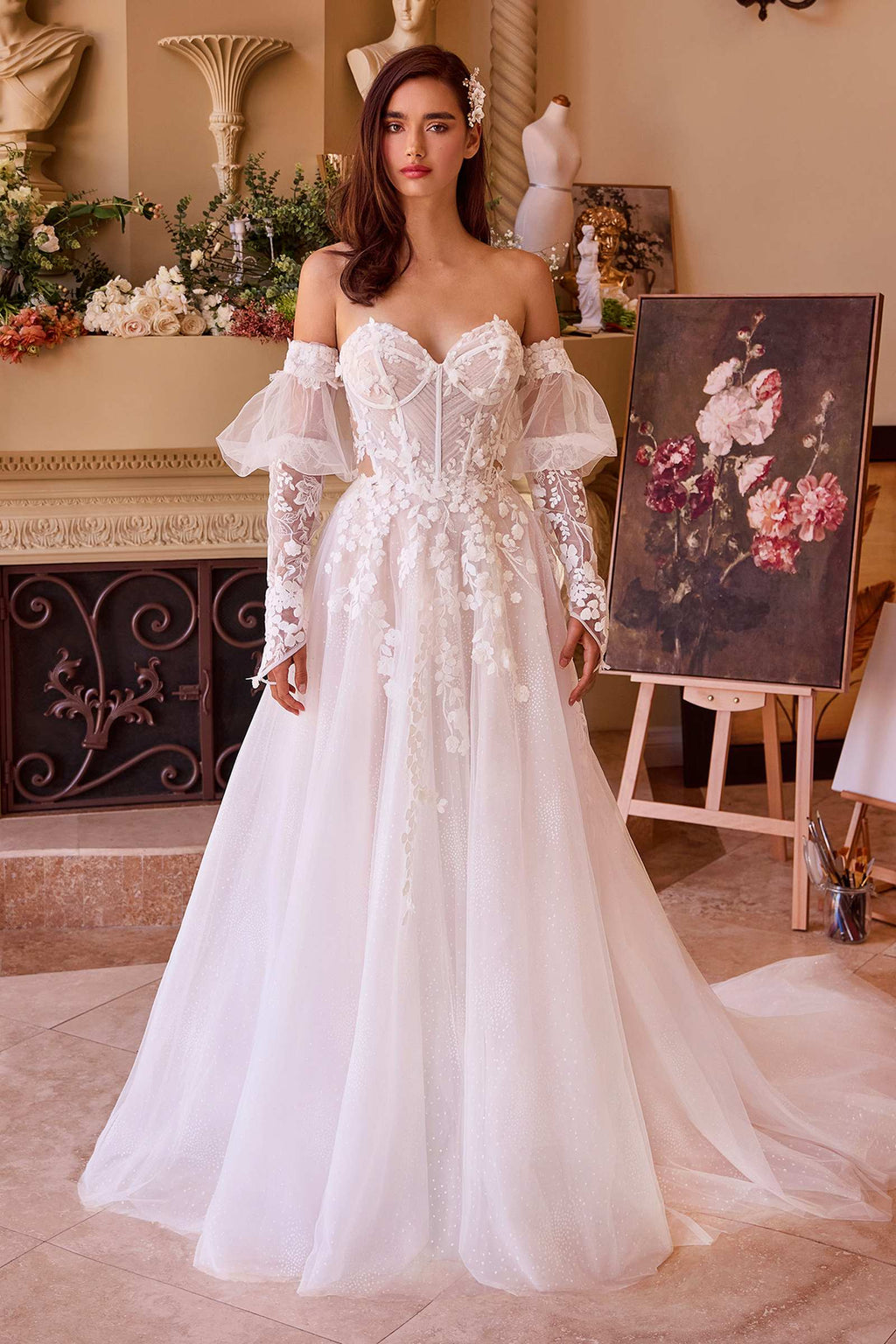 Off-white floral appliqued strapless wedding ball gown with sheer puff sleeves