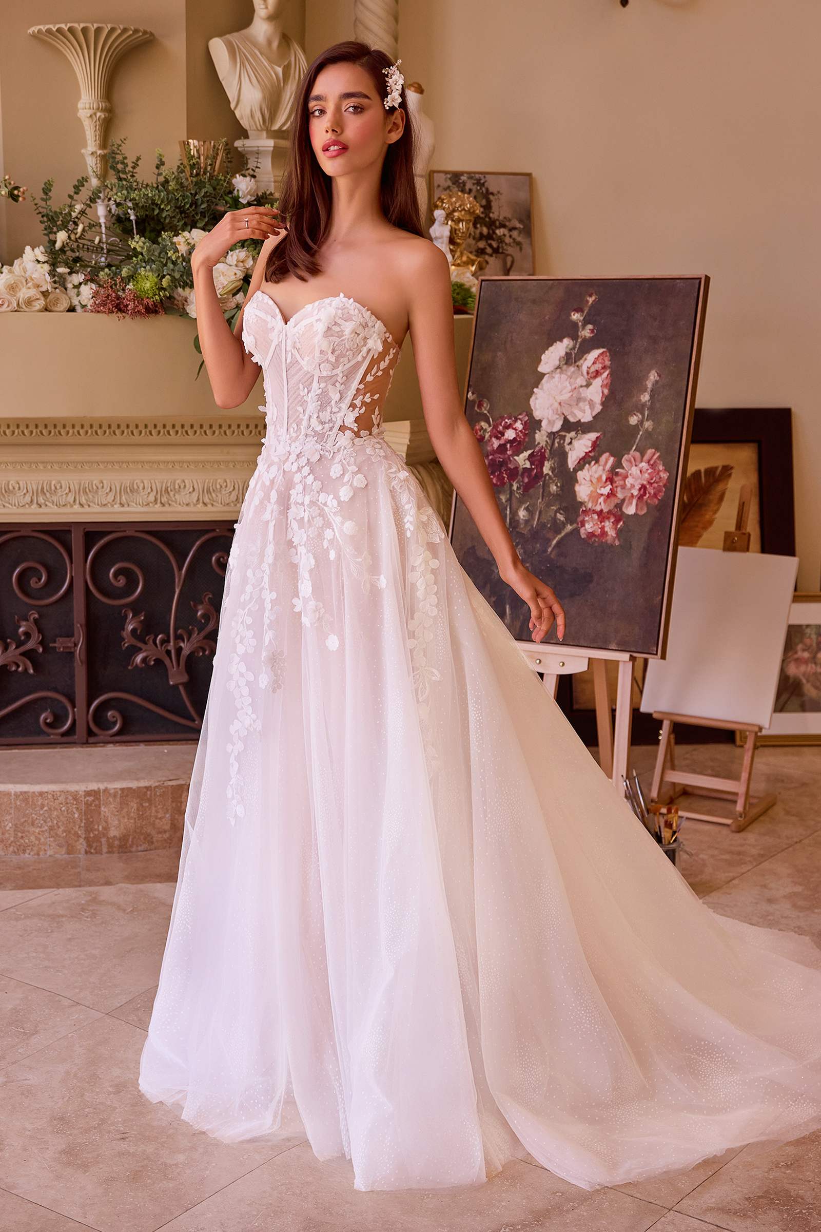 Off-white floral appliqued strapless wedding ball gown with fitted bodice and tulle skirt