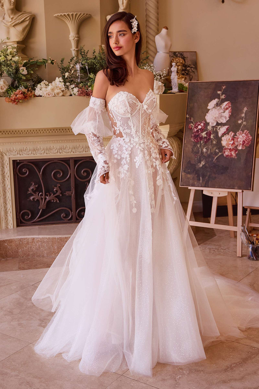 Off-white strapless wedding ball gown with floral appliques, sheer sleeves, and corset bodice