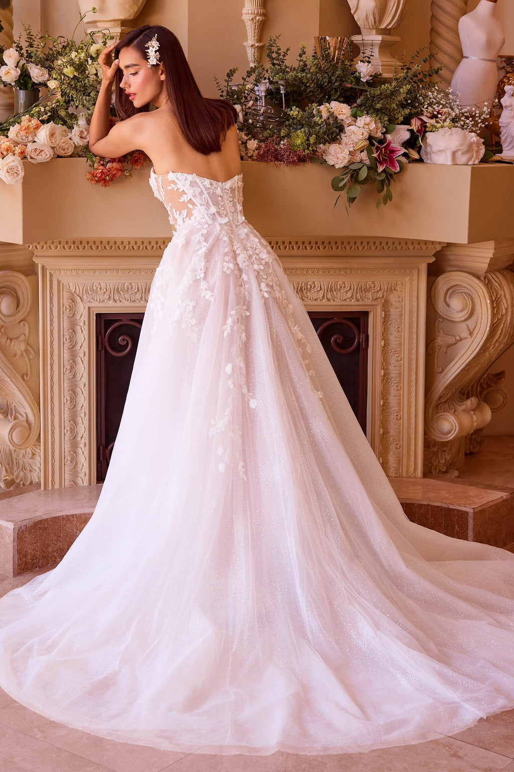 Off-white floral appliqued strapless wedding ball gown with full skirt and lace detailing