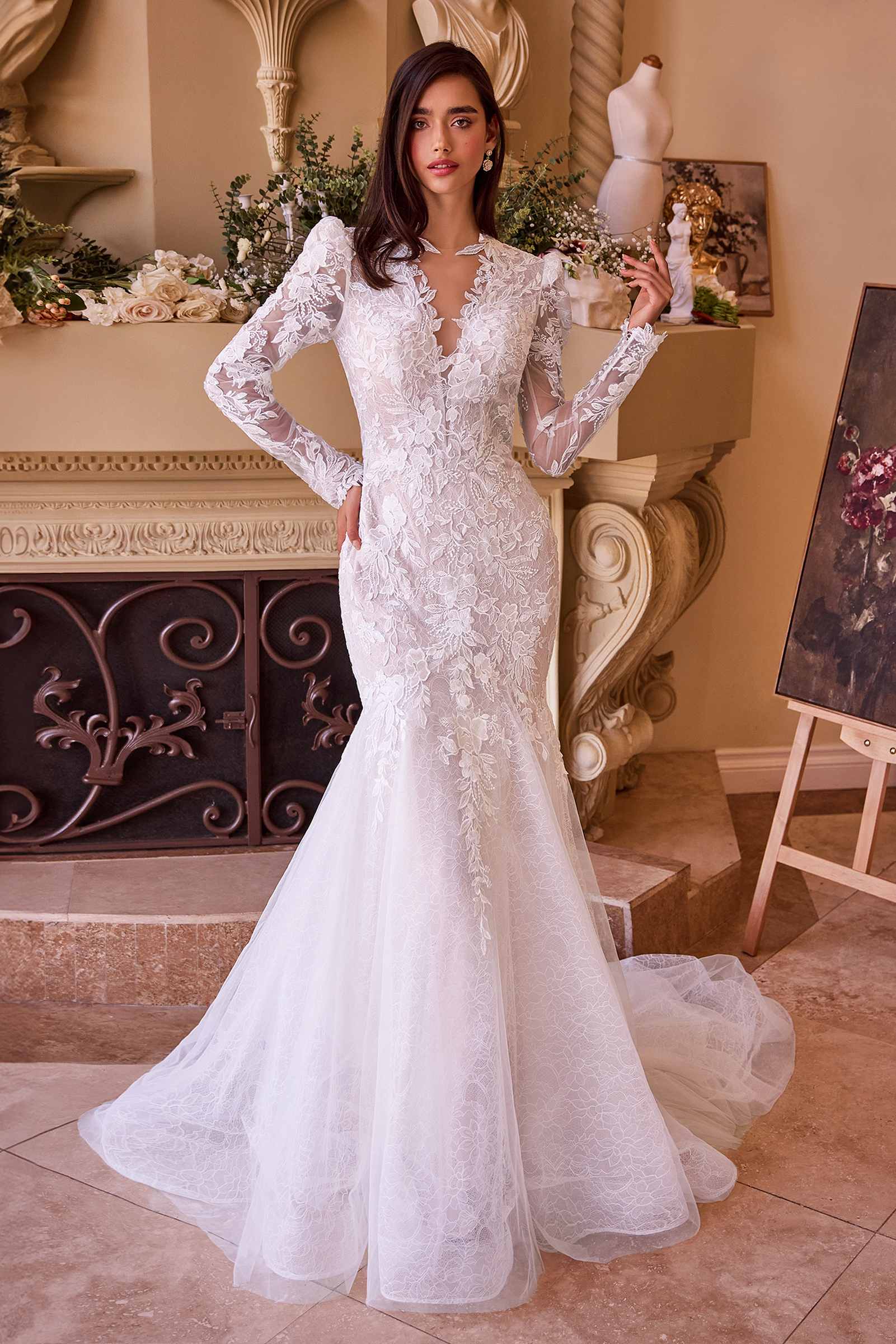 Off-white lace mermaid bridal gown with long sleeves and deep V neckline