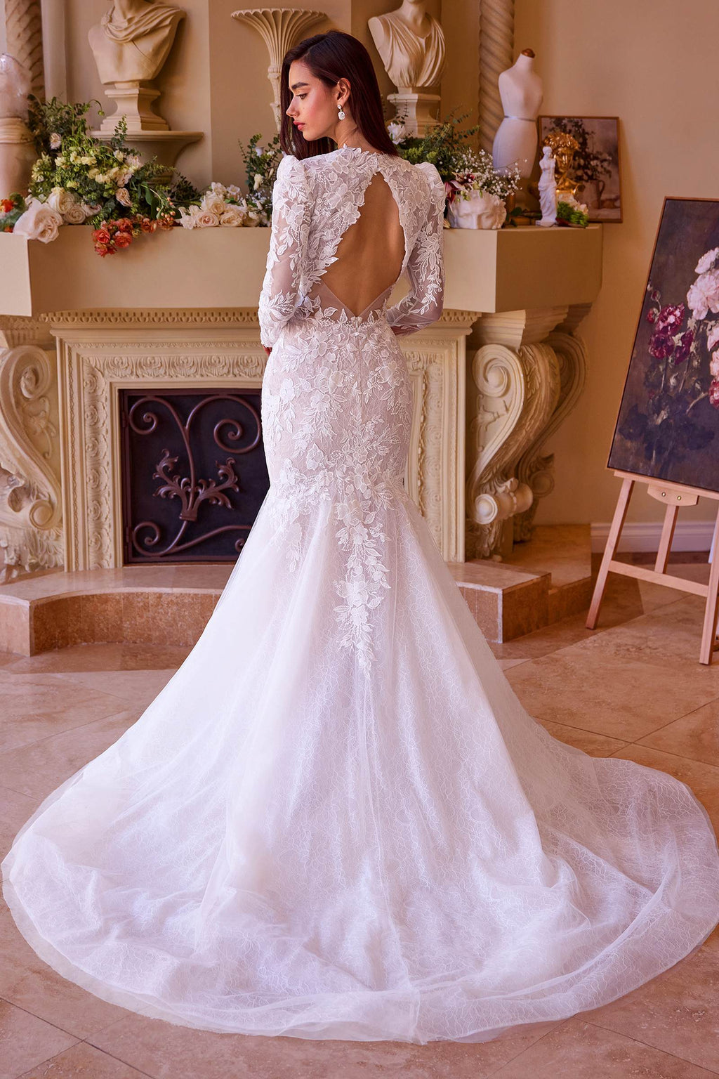 Off-white lace mermaid bridal gown with open back and long sleeves