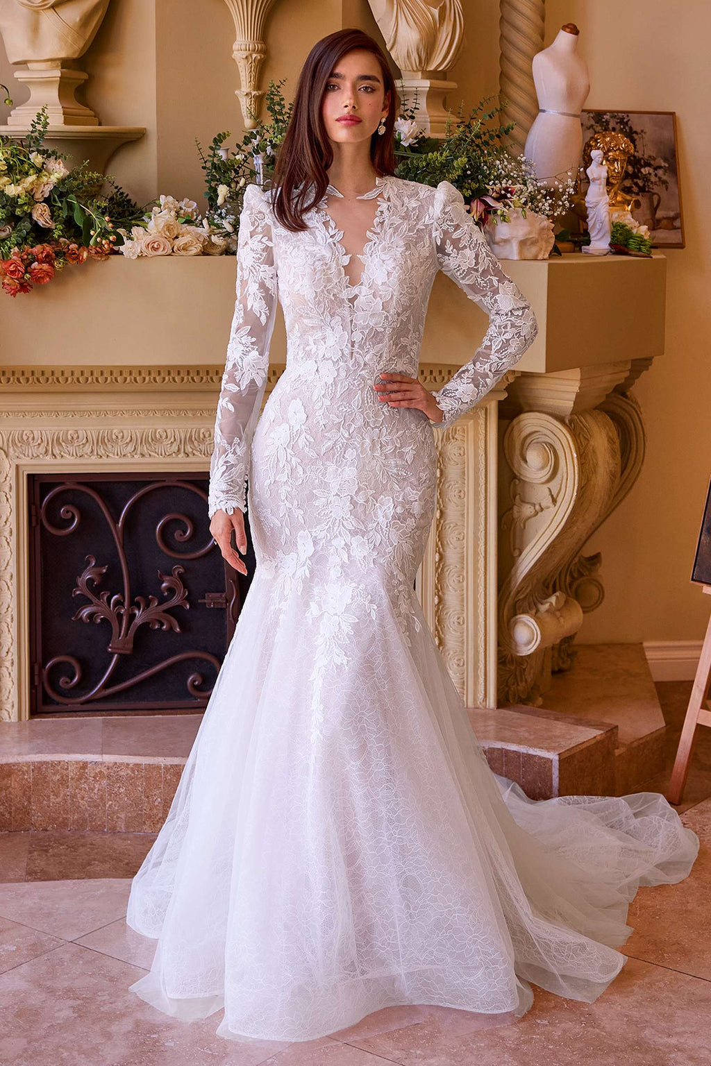 Off-white lace mermaid bridal gown with long sleeves and sheer lace overlay