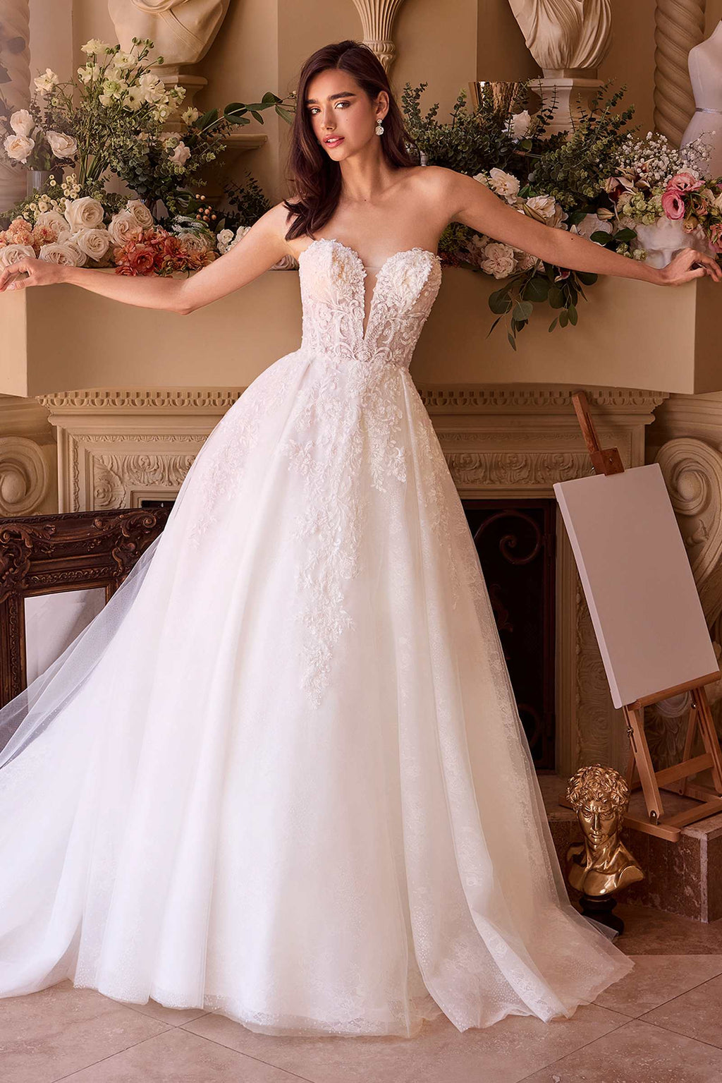 Off-white strapless lace wedding ball gown with fitted bodice and full tulle skirt