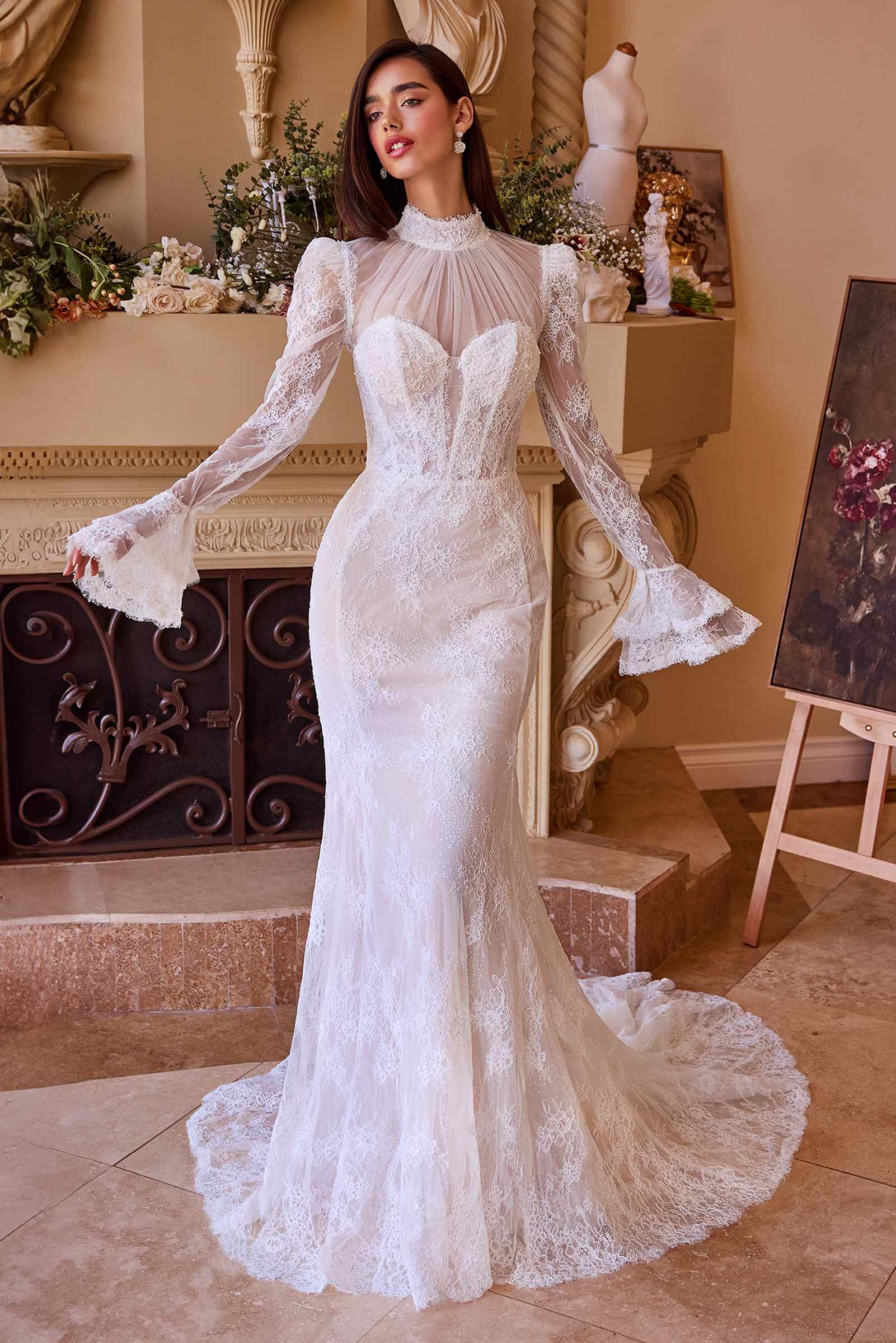 Long-sleeve lace bridal gown in off-white with heart corset detail and flared hem