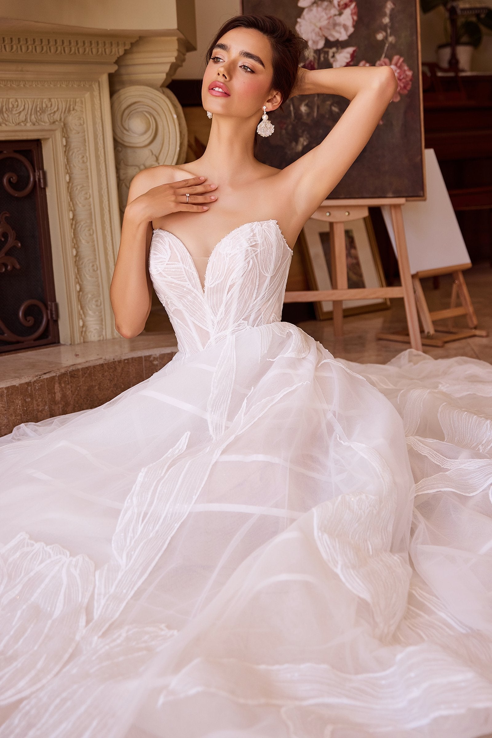 Off-white corset-style wedding ball gown with sweetheart neckline and embroidered tulle bodice