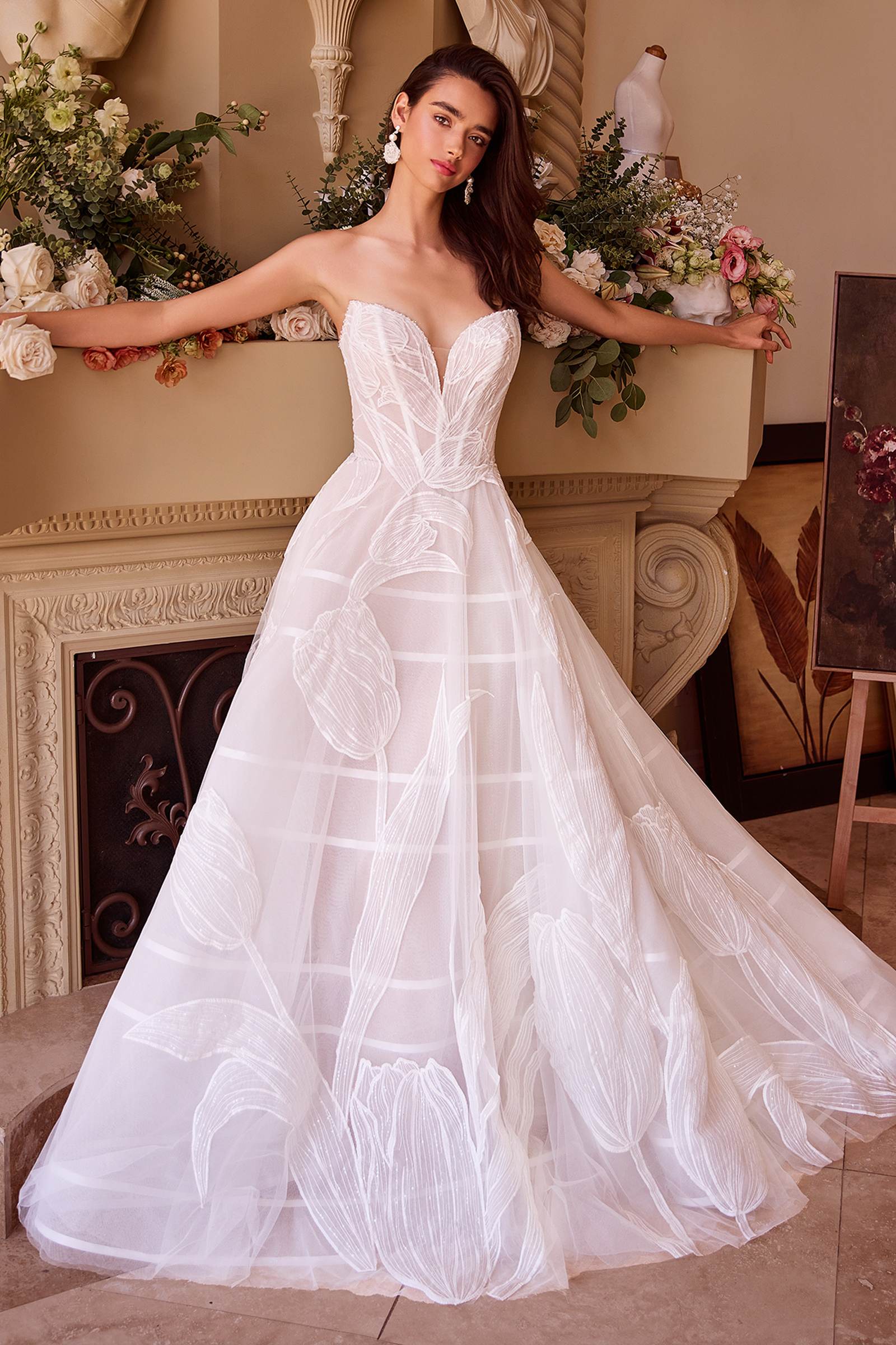 Off-white tulle ball gown with sweetheart bodice and layered skirt with embroidered appliques