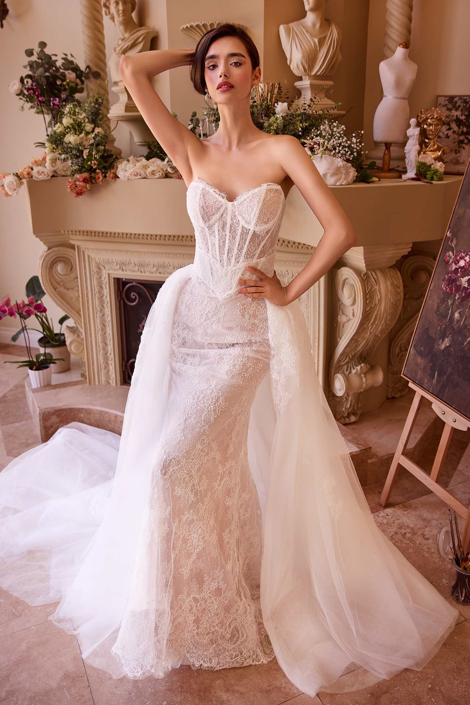 Off-white fitted lace wedding dress with sweetheart neckline and removable overskirt